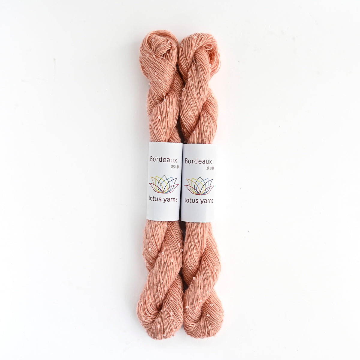 Bordeaux, two skeins in shade 05 with their Lotus Yarns label