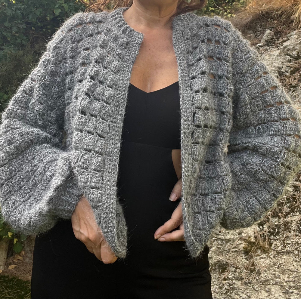 Oversized grey crochet cardigan with openwork sleeves